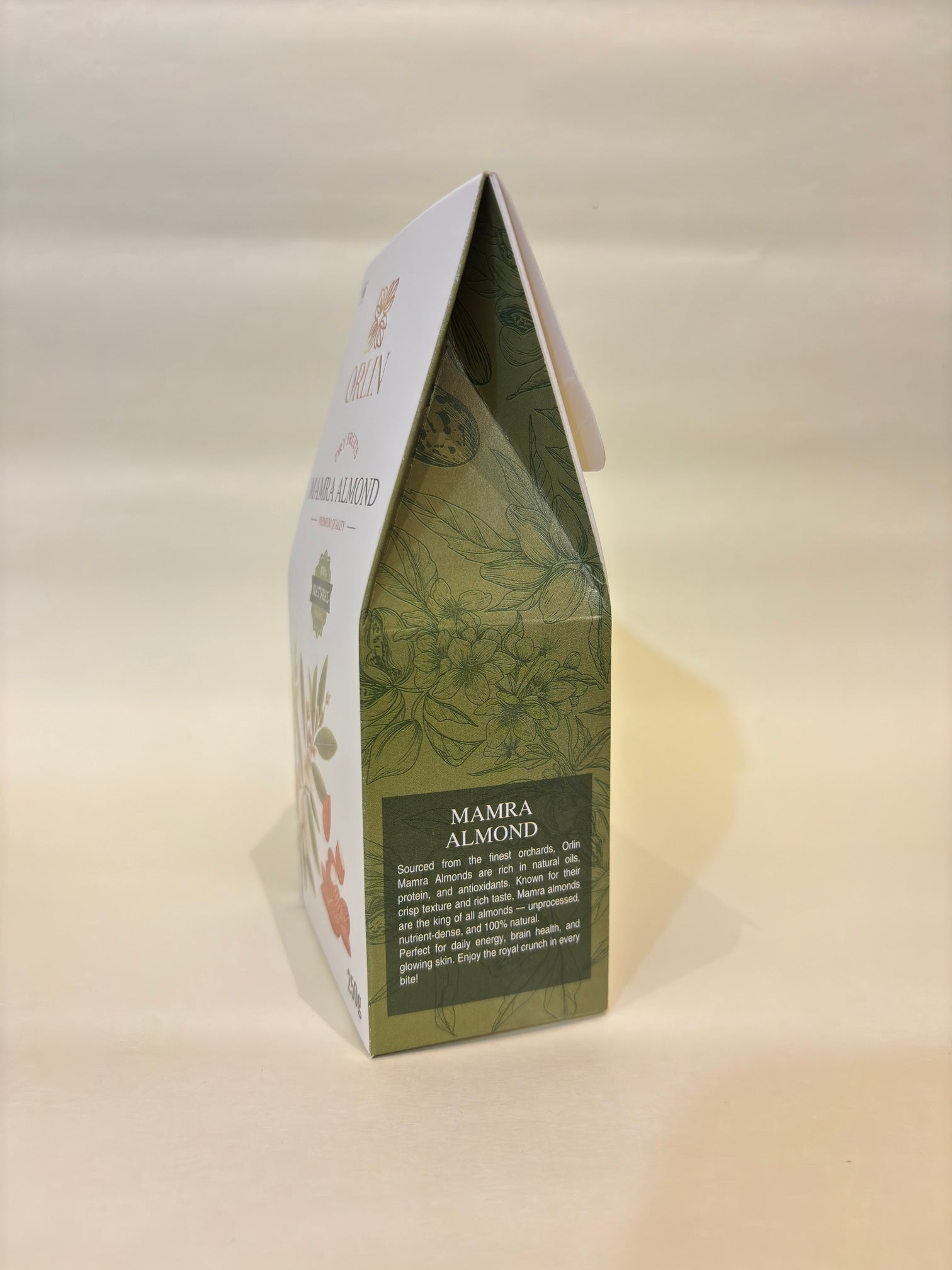 Green and white product packaging on a beige background