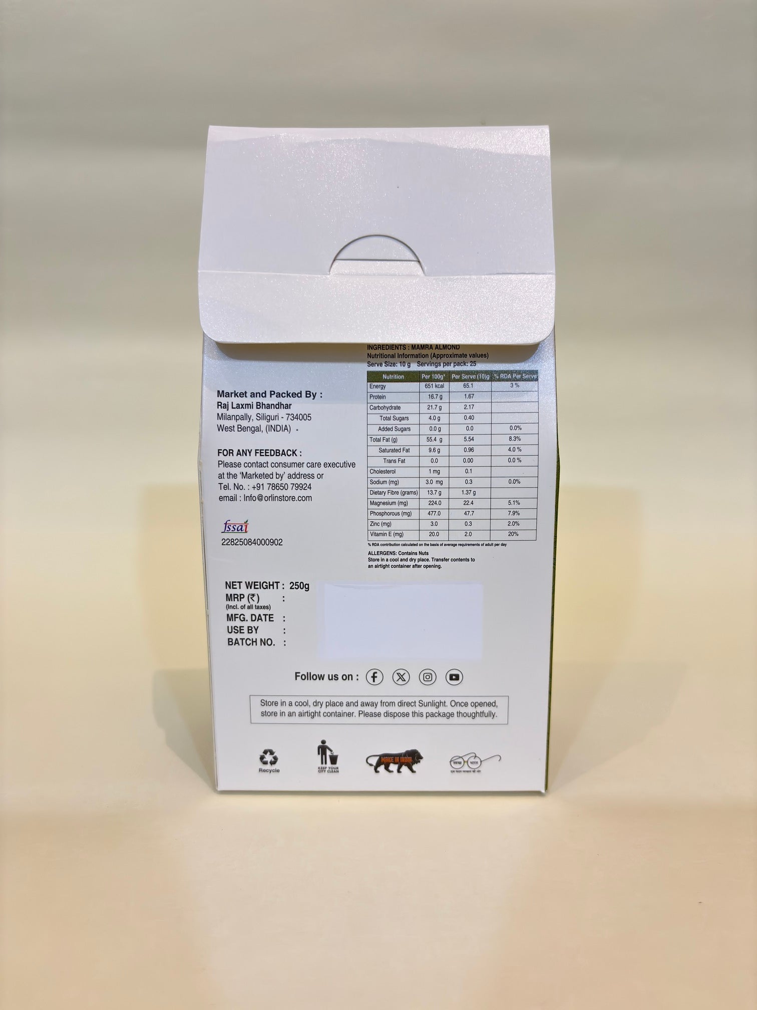 Product packaging with nutritional information on a beige surface