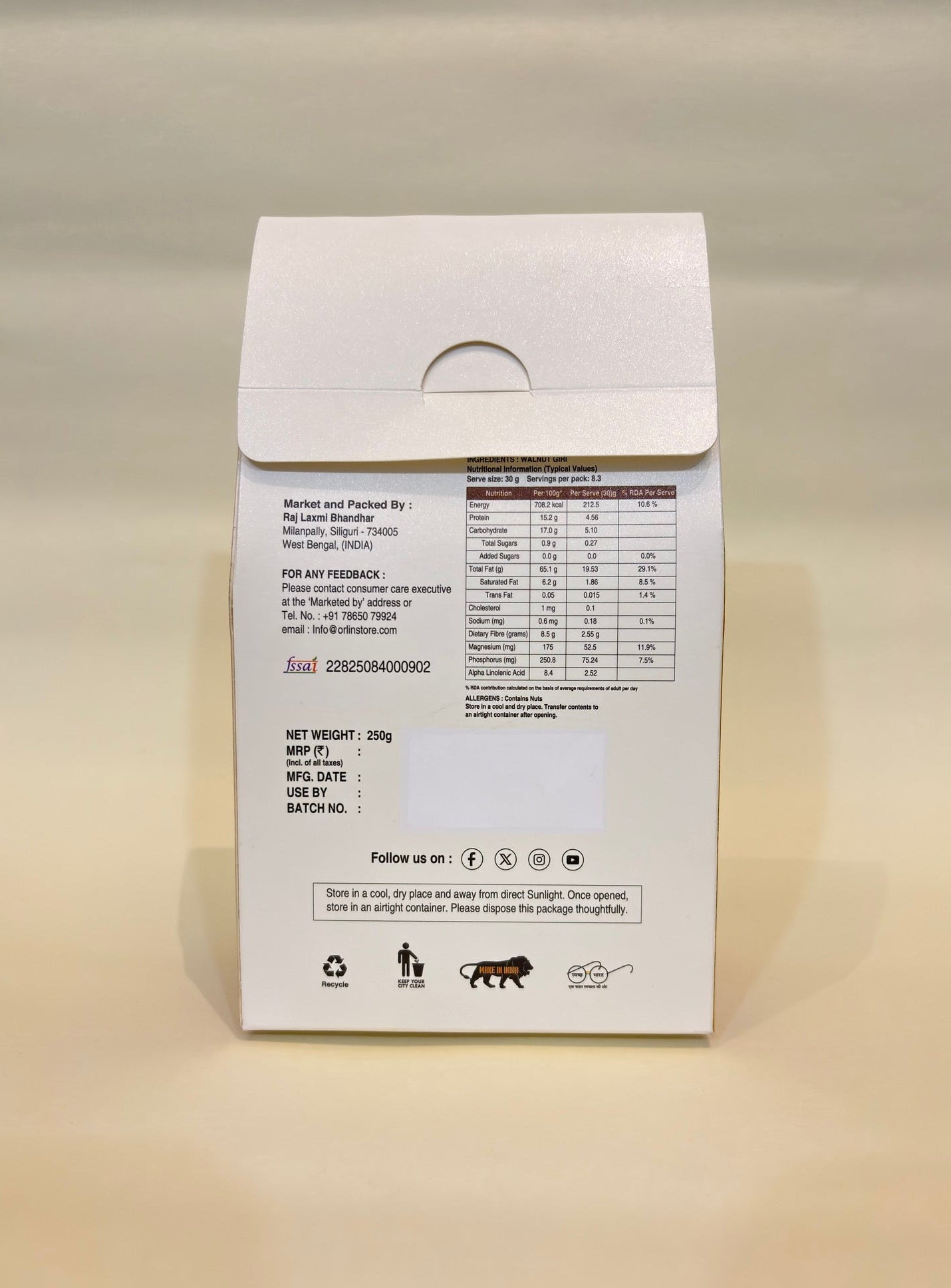 Product packaging with nutritional information on a beige surface