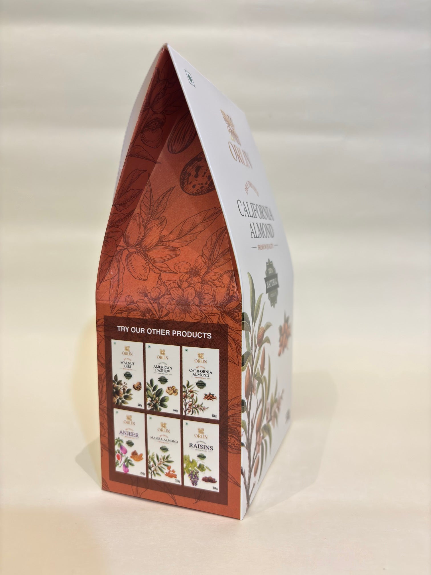 Decorative box with botanical designs on a light background