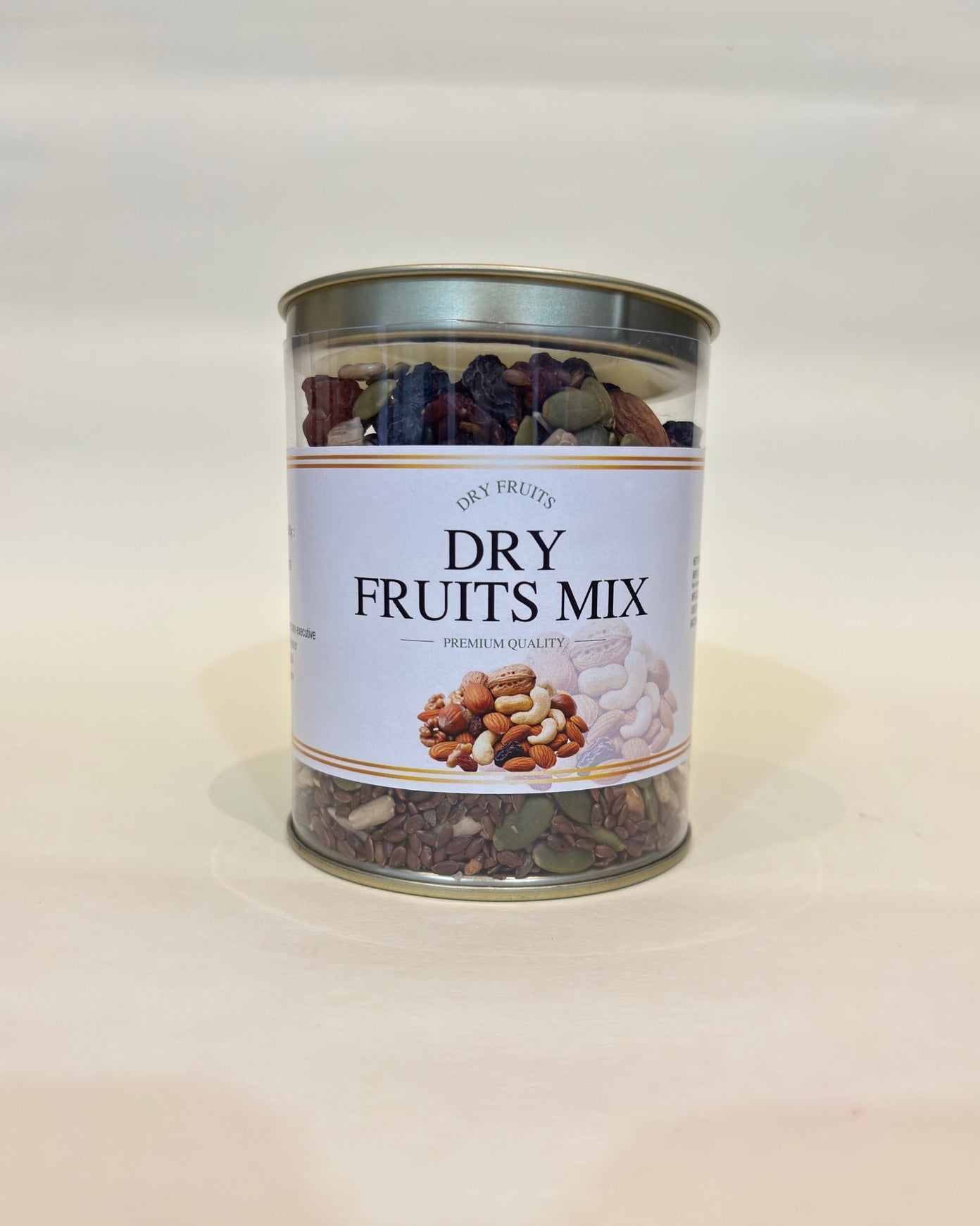 Canister of dry fruits mix on a light background