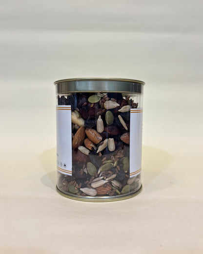 Canister of mixed seeds on a white background